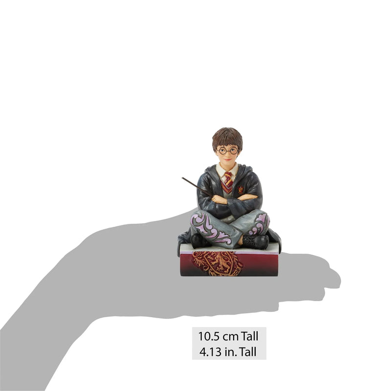 Figurine Harry Potter assis avec baguette – Collection Jim Shore