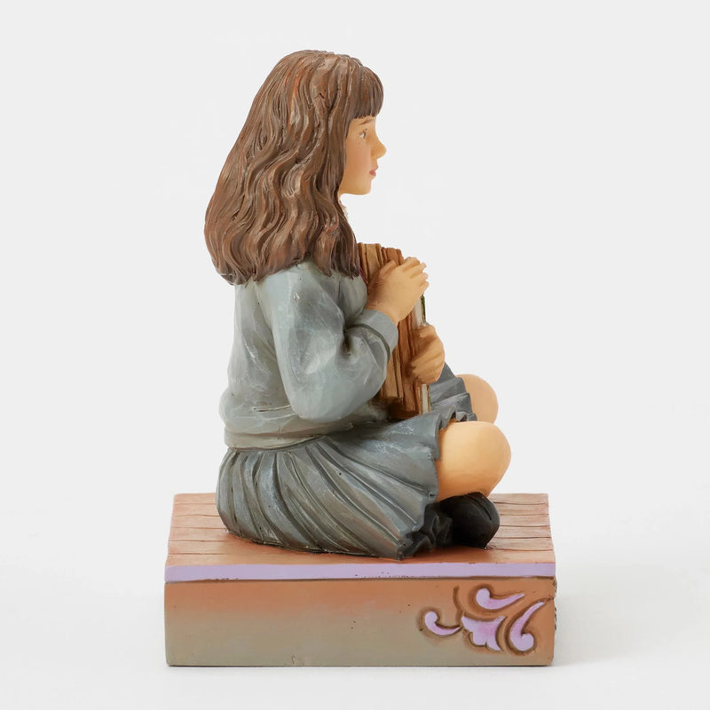 Figurine Harry Potter by Jim Shore – Hermione Granger assise avec ses livres