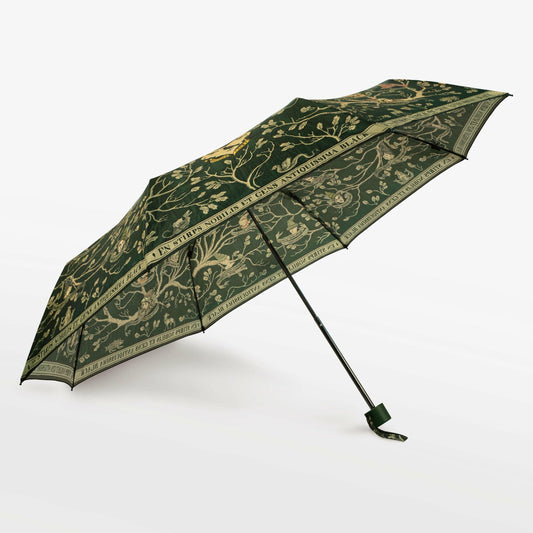 parapluie vert foncé ouvert, avec le motif de l'arbre genealogique de la famille Black dans Harry Potter