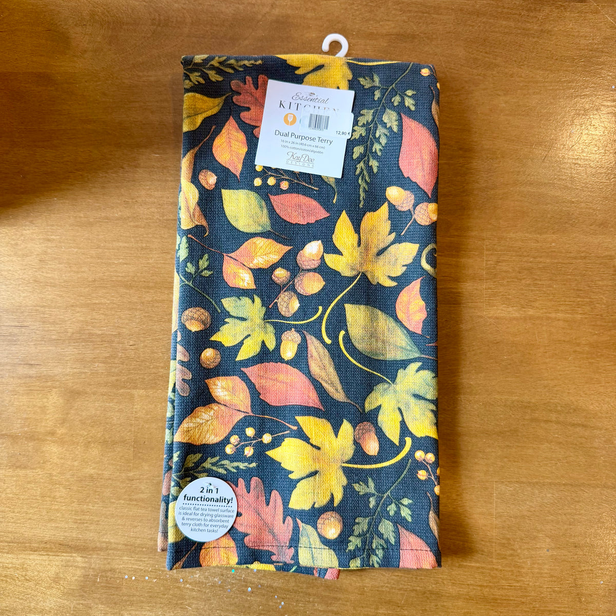 Torchon essuie-éponge en coton à motifs de feuilles et glands aux couleurs d'automne sur fond sombre