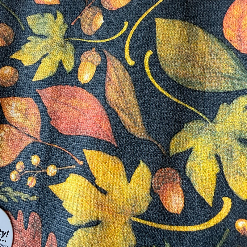 Torchon essuie-éponge en coton à motifs de feuilles et glands aux couleurs d'automne sur fond sombre