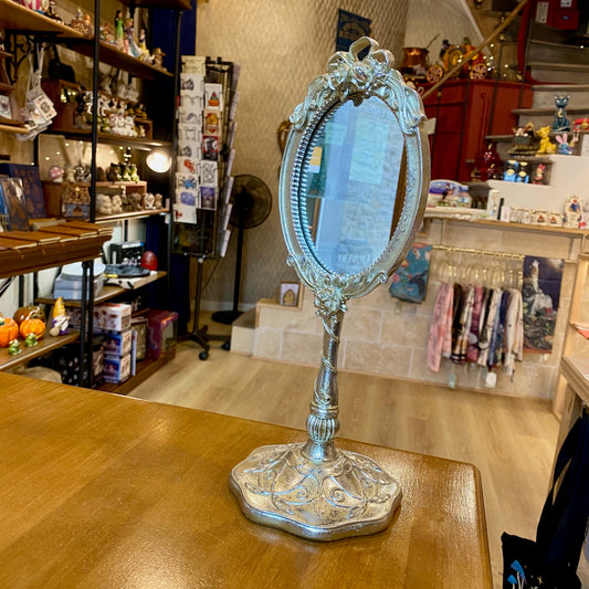 Miroir sur pied style baroque argenté doré
