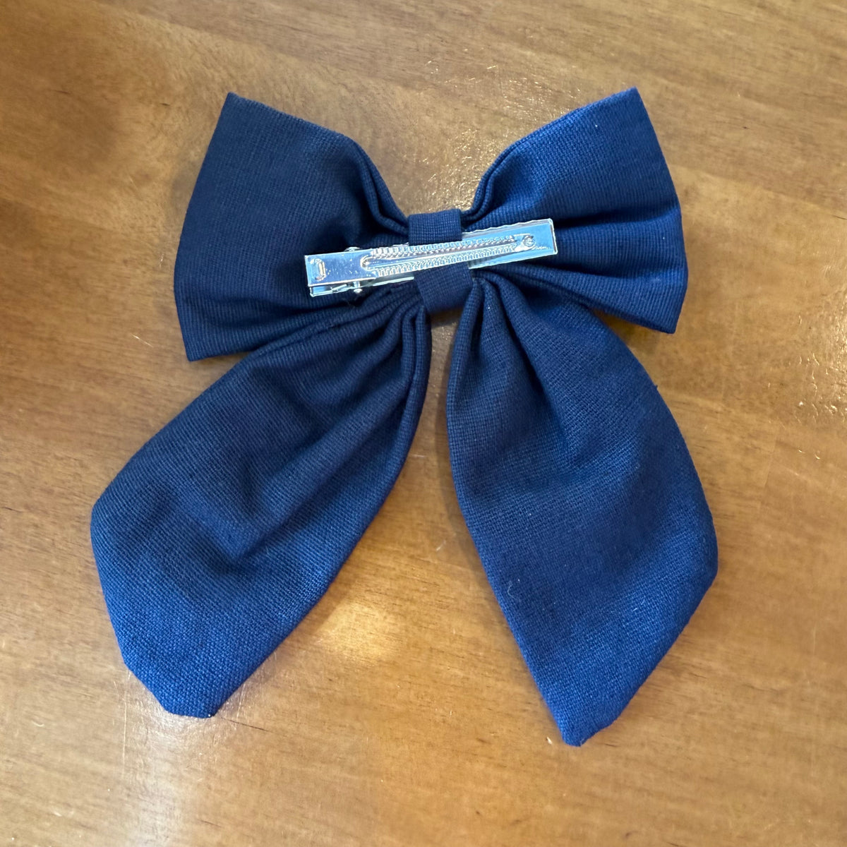 Pince à cheveux nœud bleu fleuri