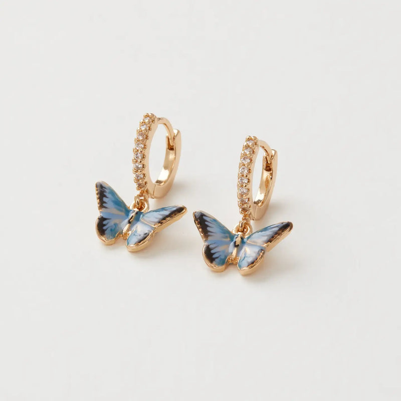 Boucles d’oreilles Fable England – Papillon bleu émaillé doré, style huggie