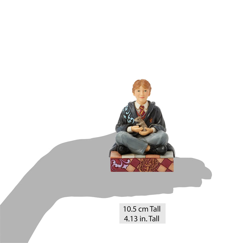 Figurine Ron Weasley assis avec Croutard – Collection Jim Shore